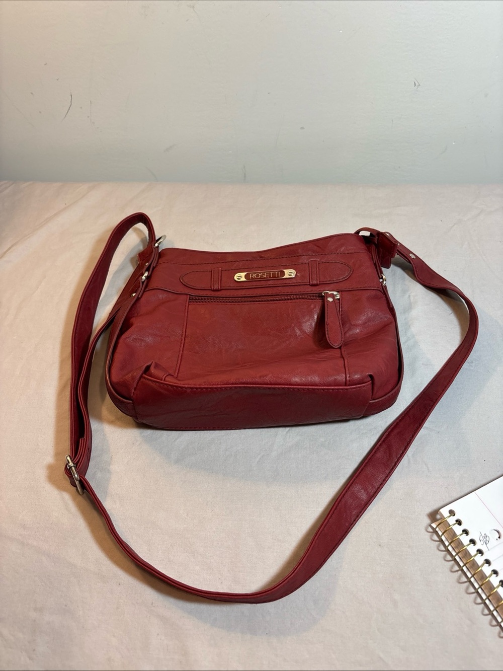 Rosetti Deep Red Leather Crossbody with Gold Plaque